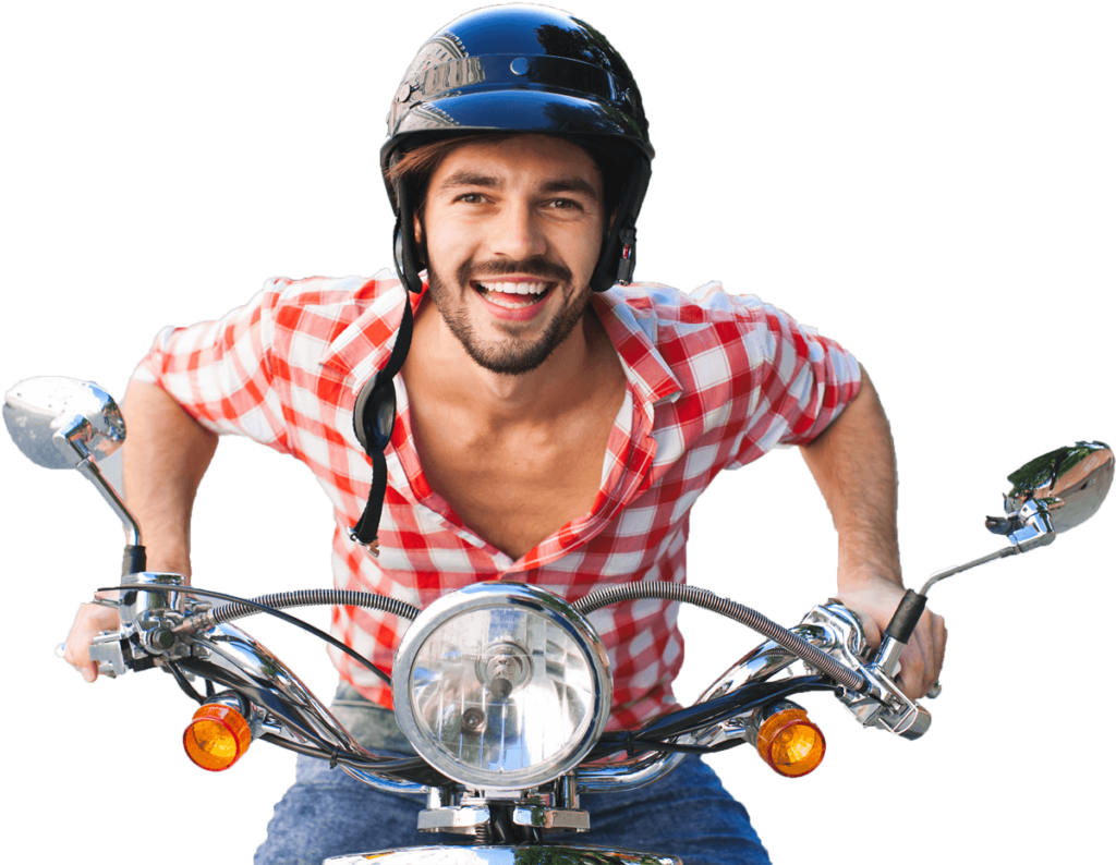 A guy is riding a bike and smiling